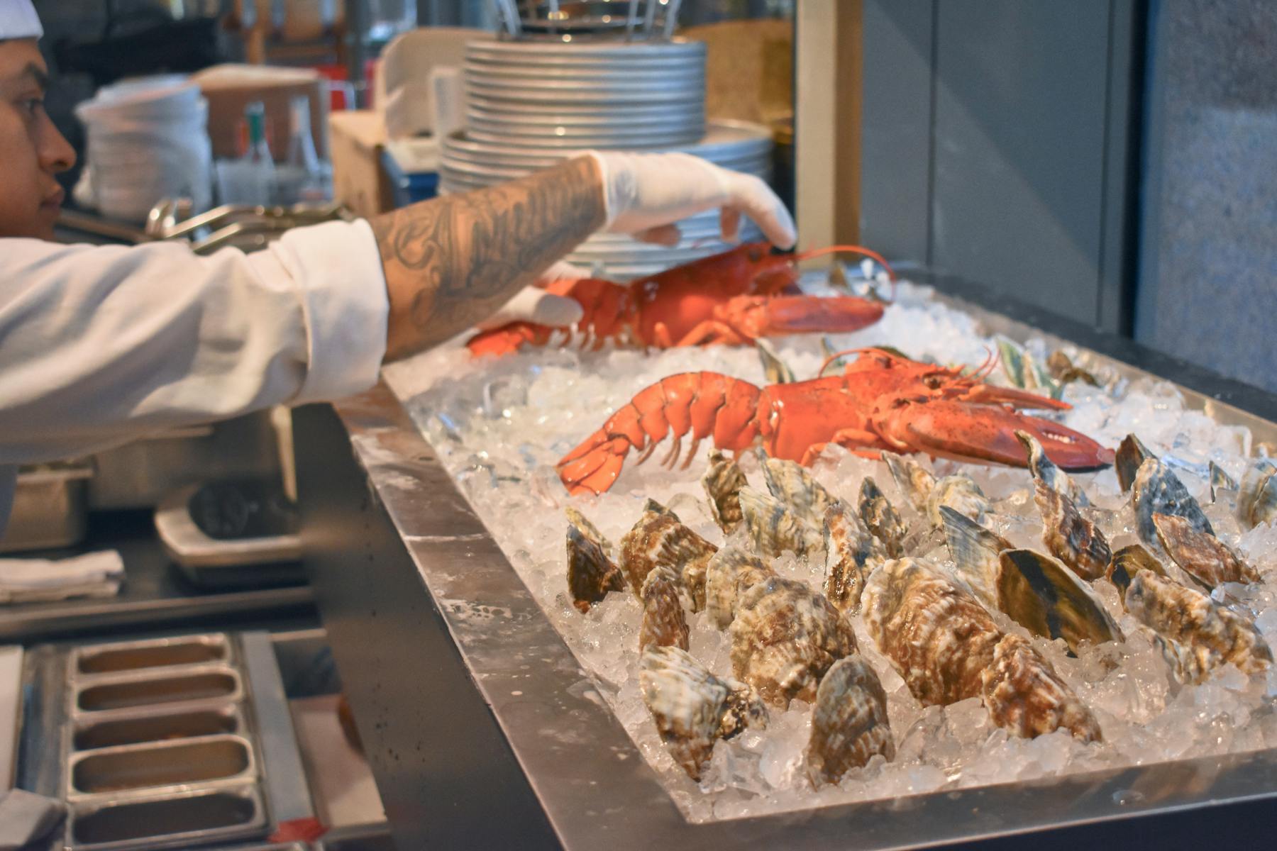 a person cooking food on a table