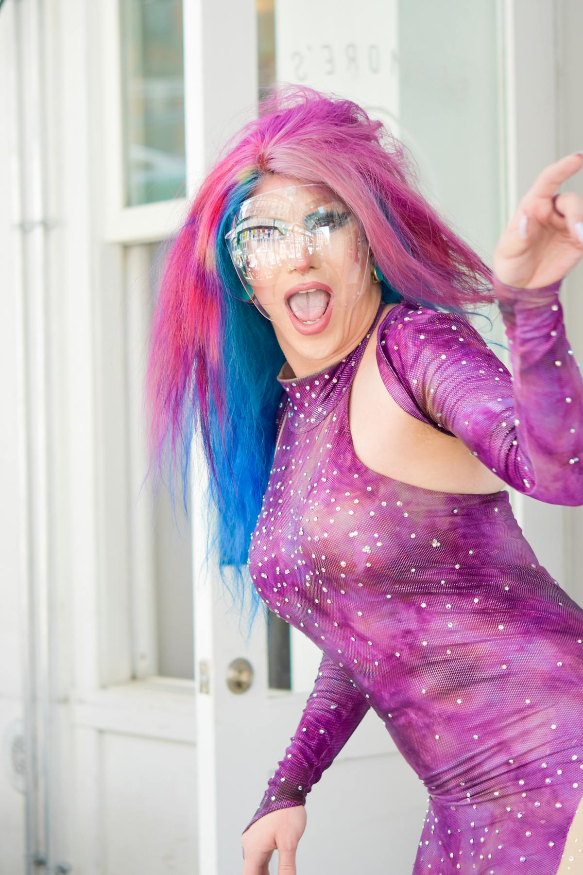 a woman wearing a purple dress