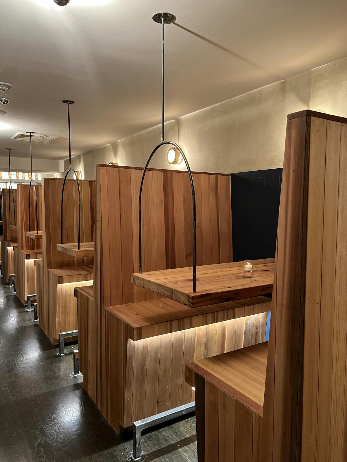 a kitchen with wooden cabinets