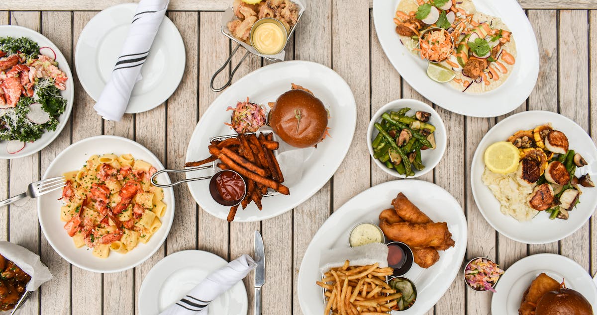 a plate is filled with different types of food on a table