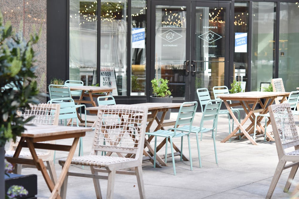 a dining room table in front of a building