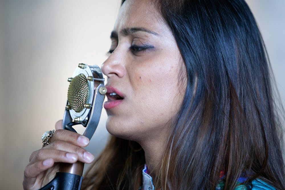 a woman wearing a microphone