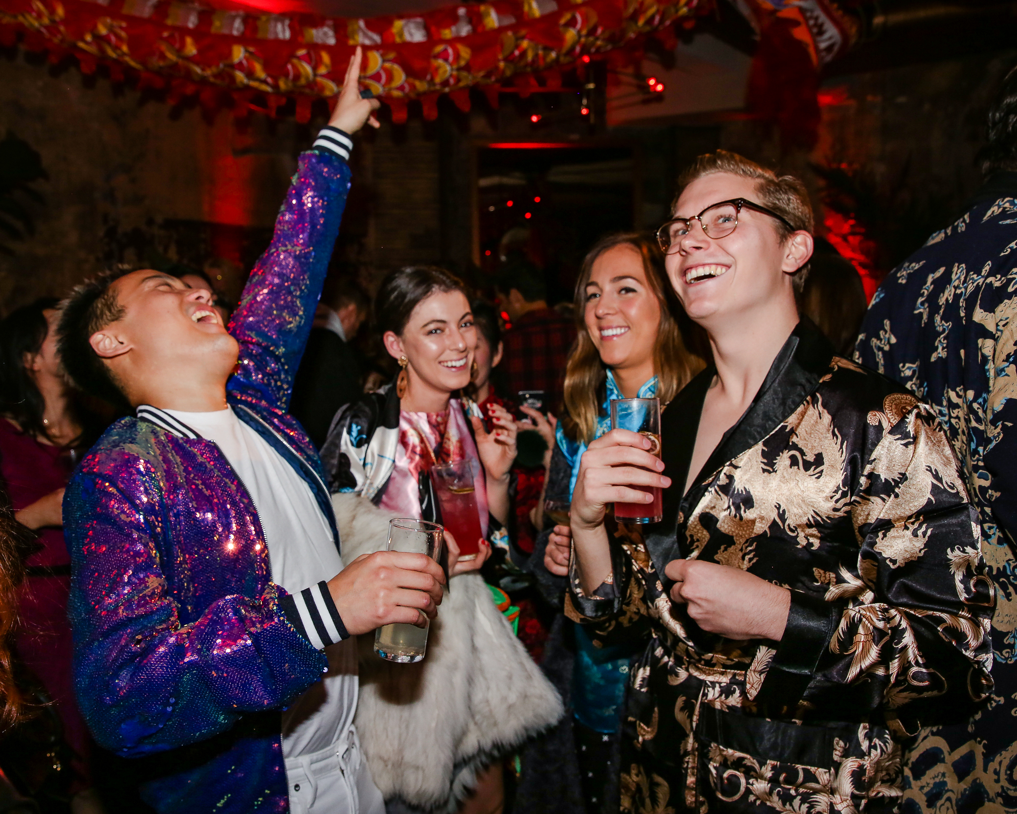 a group of people having fun at party