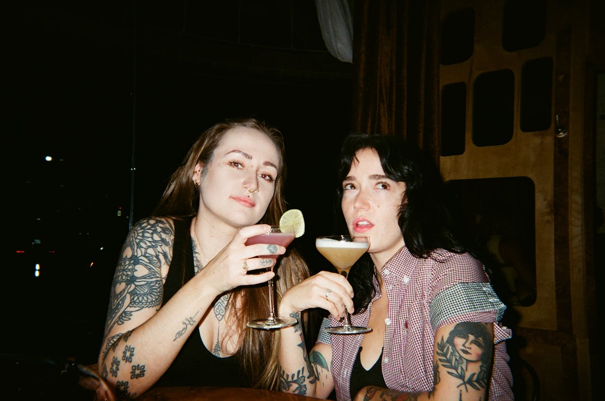 a group of women drinking cocktails