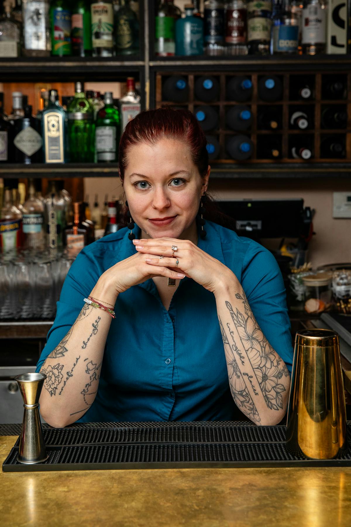 a person sitting at a table in a restaurant