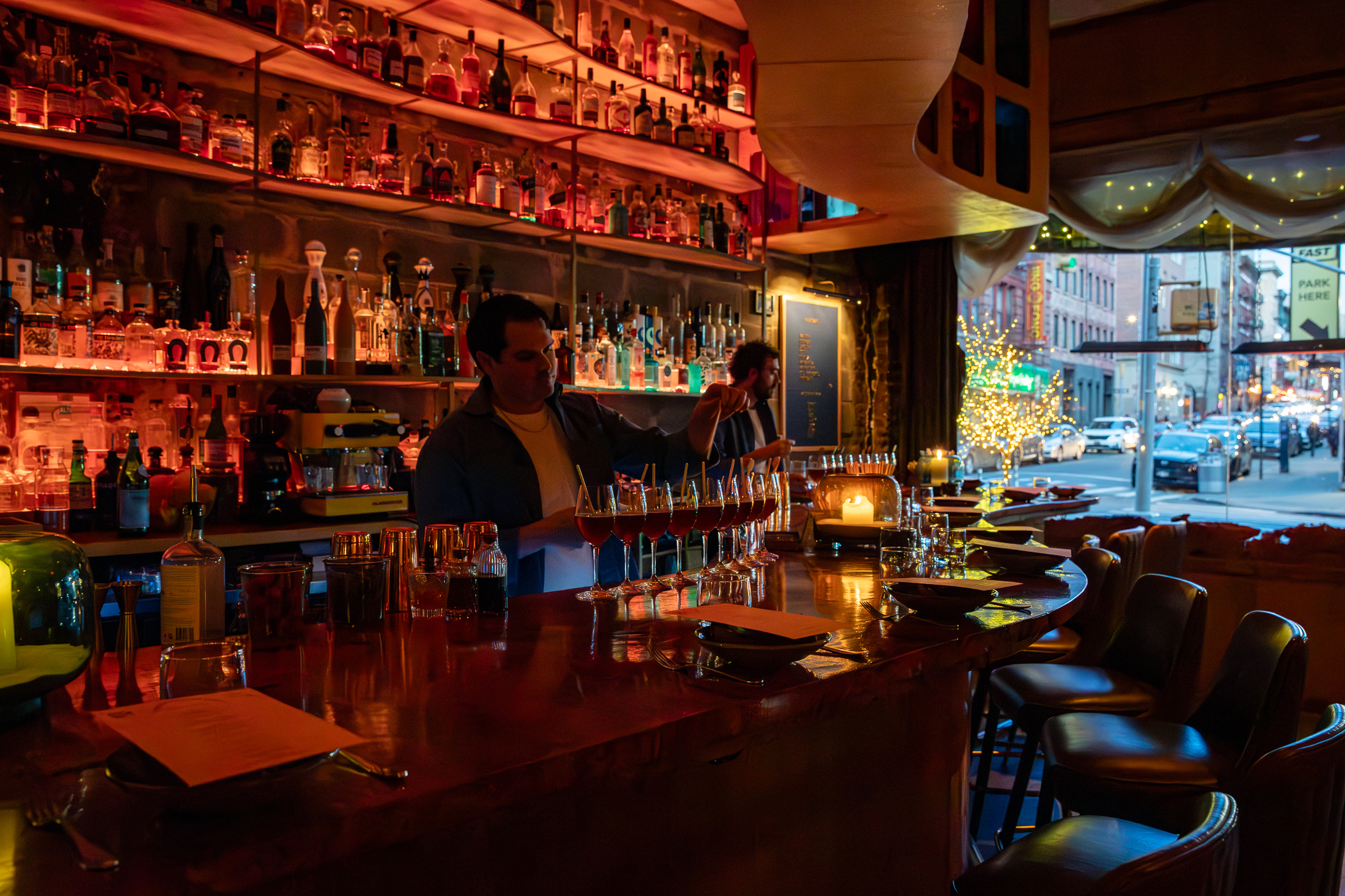 a man standing at a bar