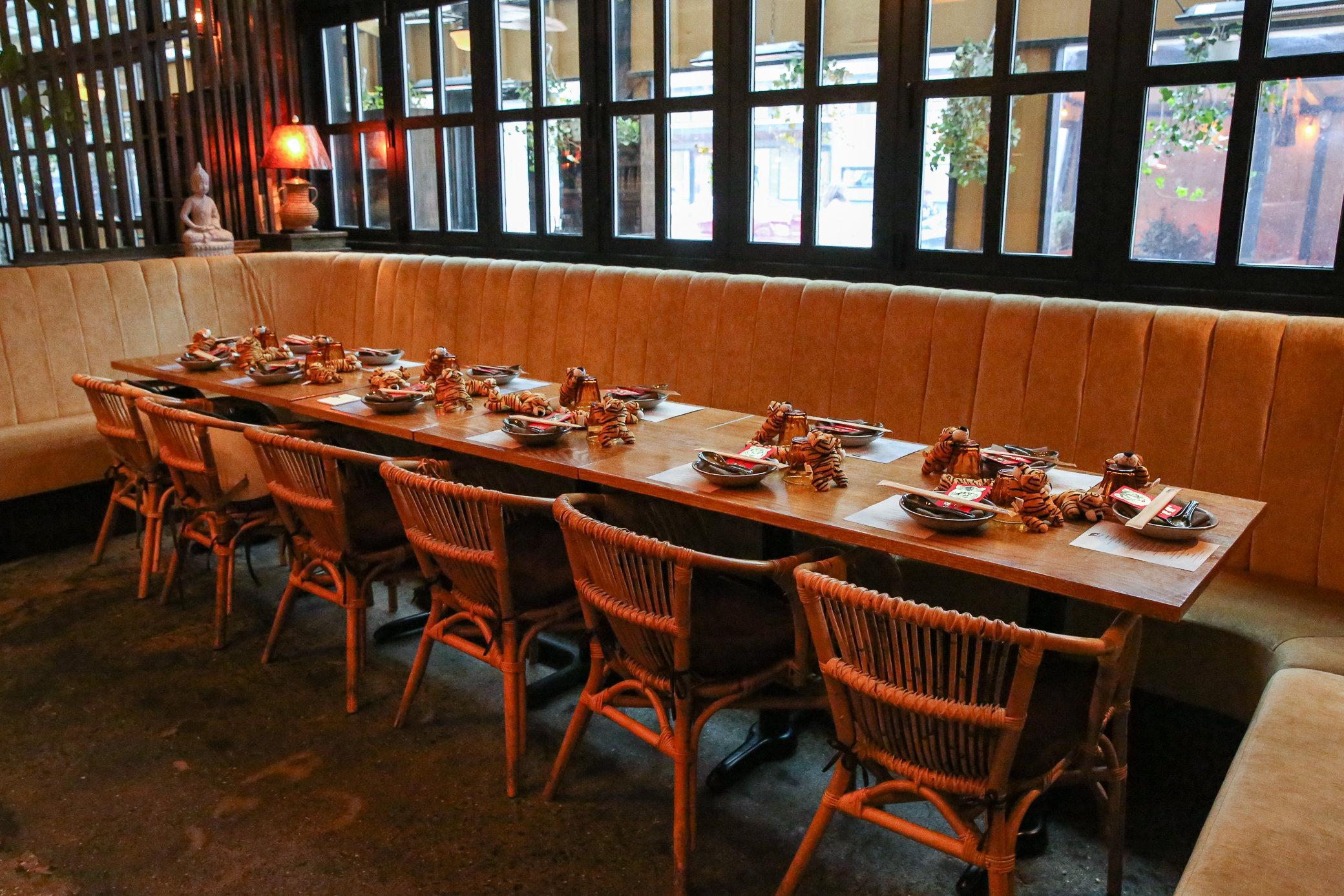 a dining room table in front of a window
