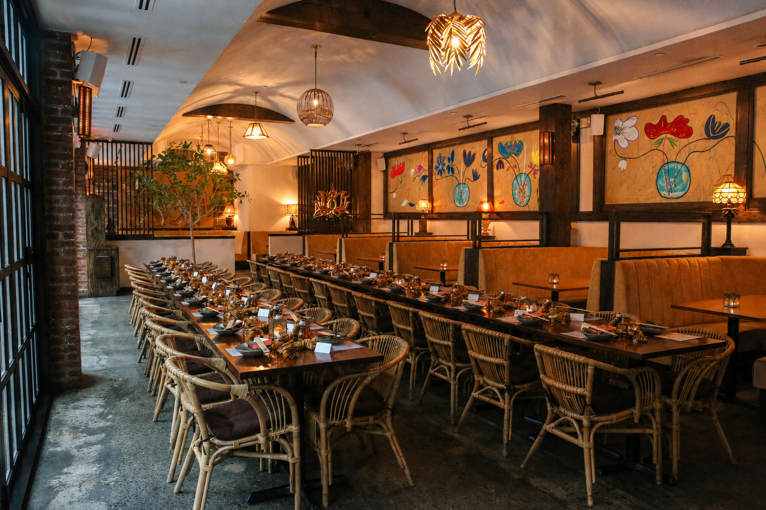 a long table with chairs and a chandelier