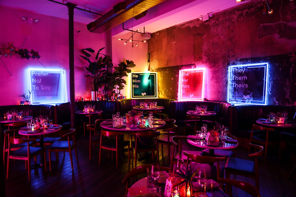 a dining room transformed into a neon lit event