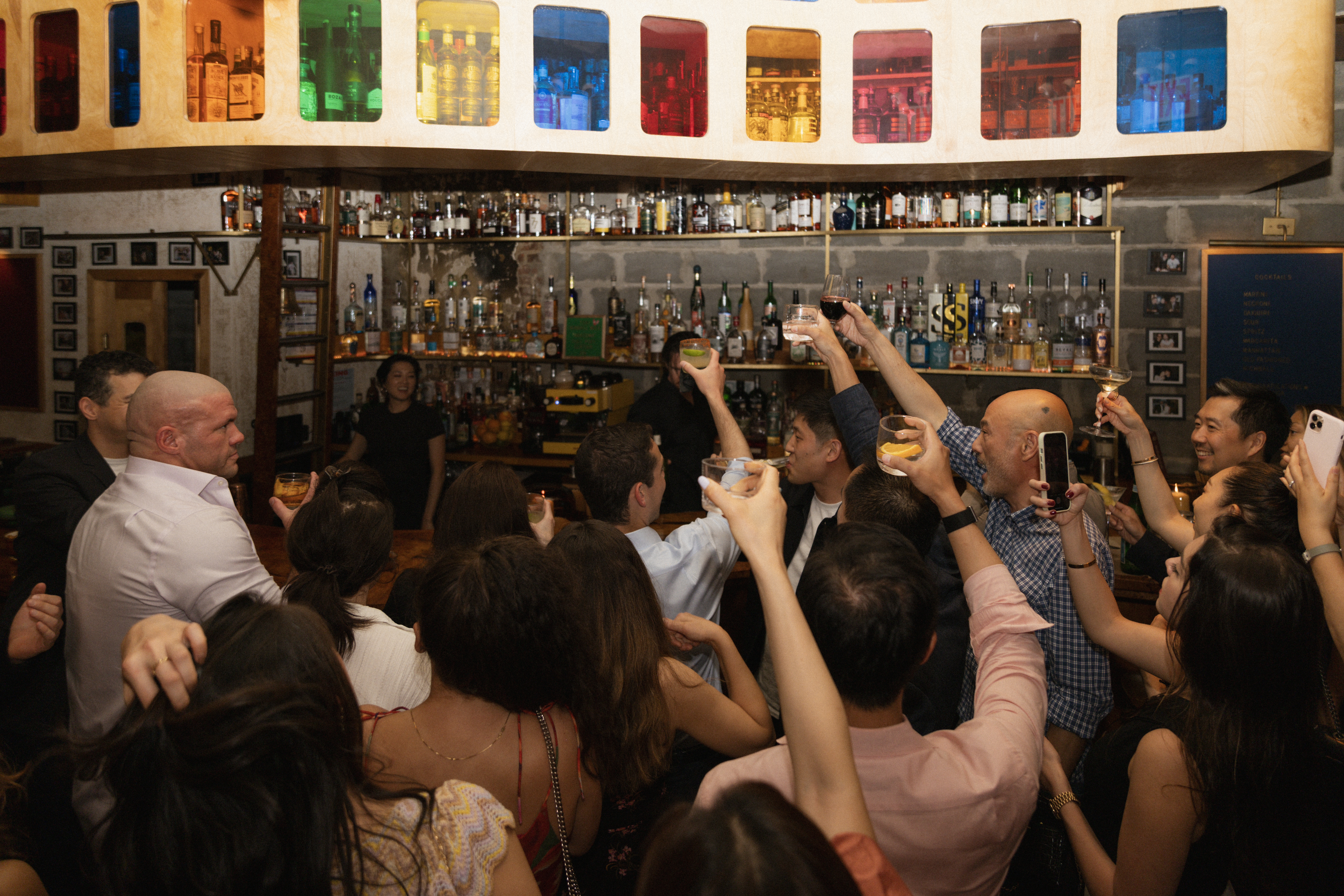 a group of people standing in front of a crowd