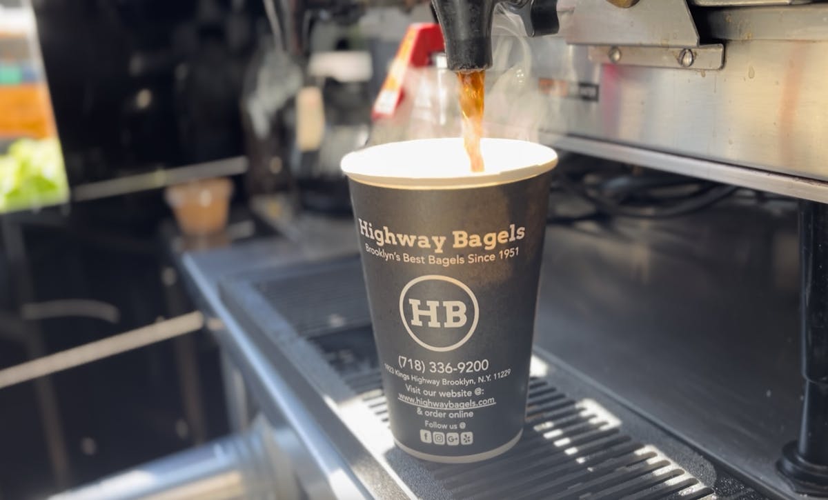 a close up of a coffee cup on a counter