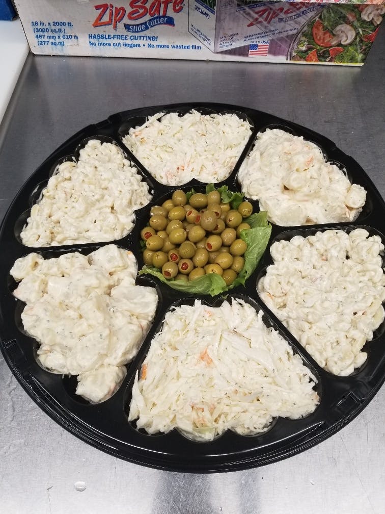 a plate of food with rice meat and cauliflower