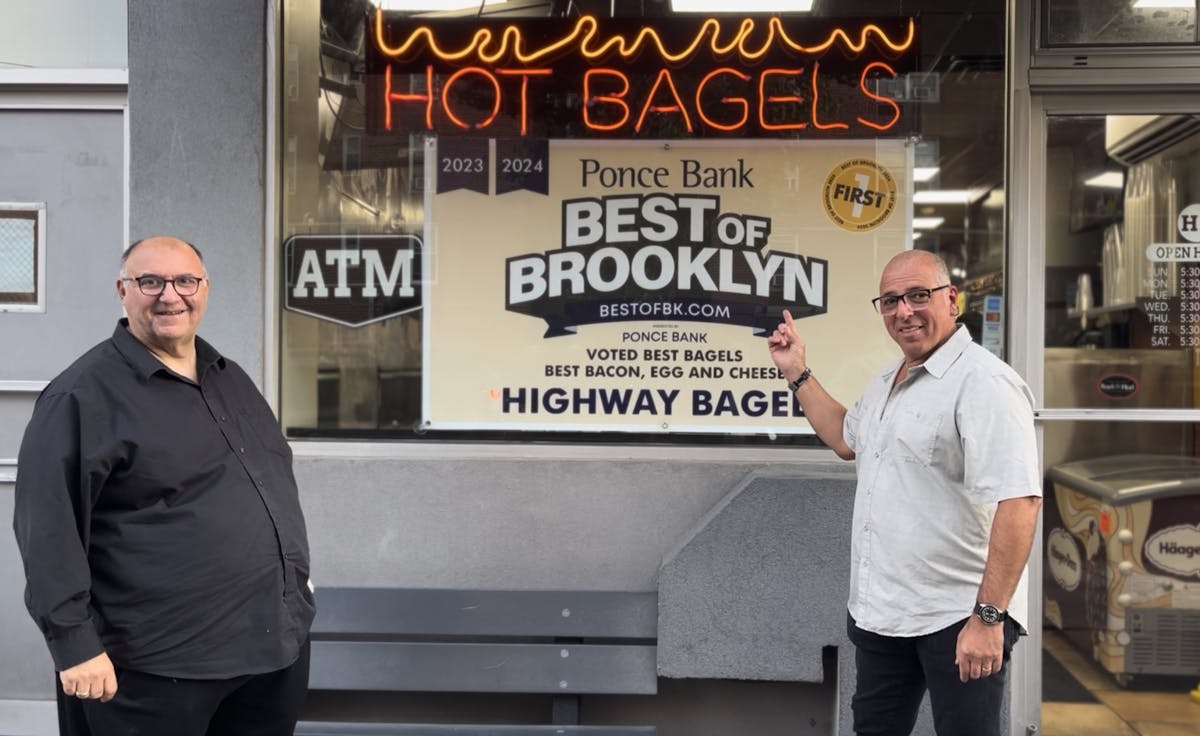a man standing in front of a store