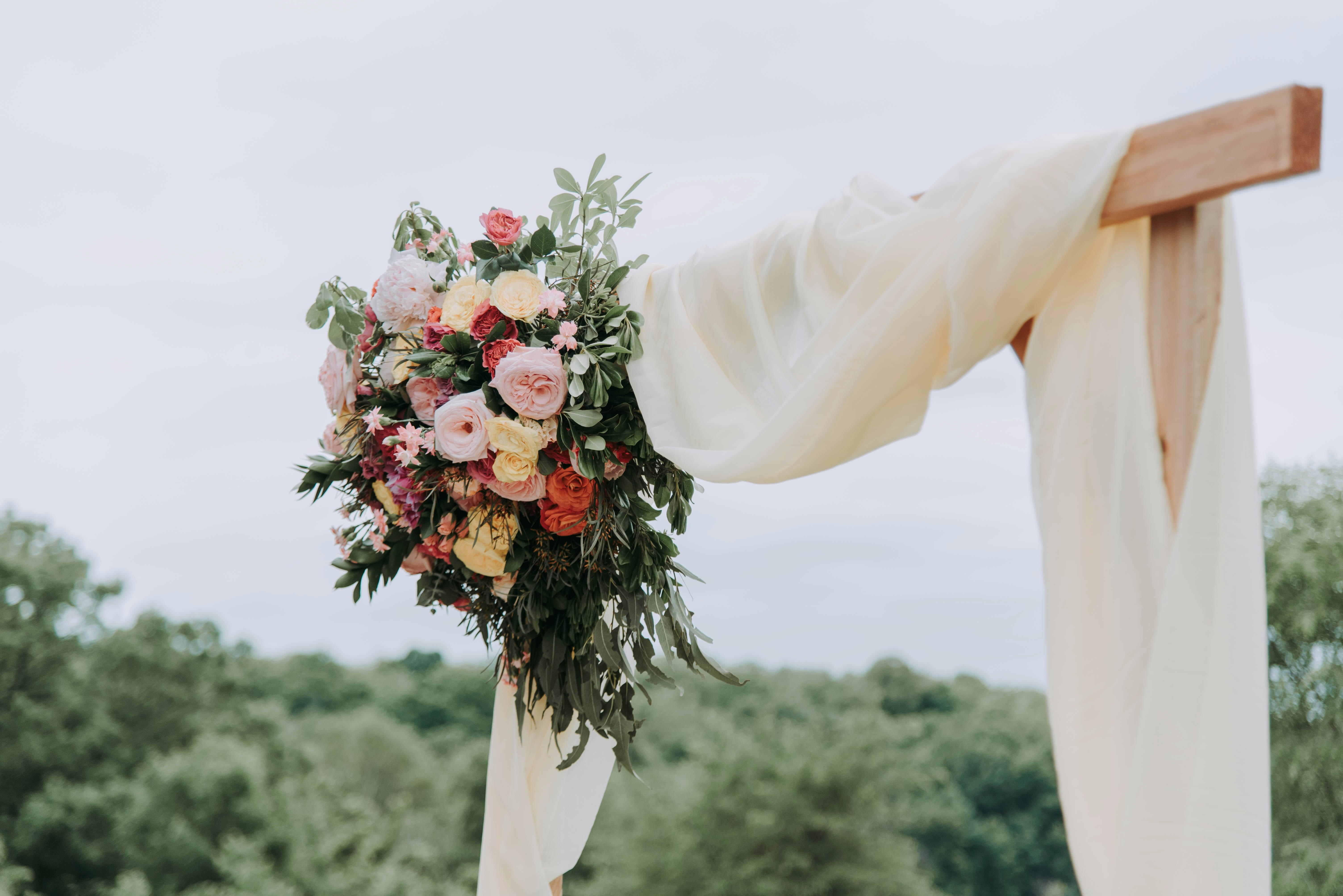 a person holding a bouquet of flowers