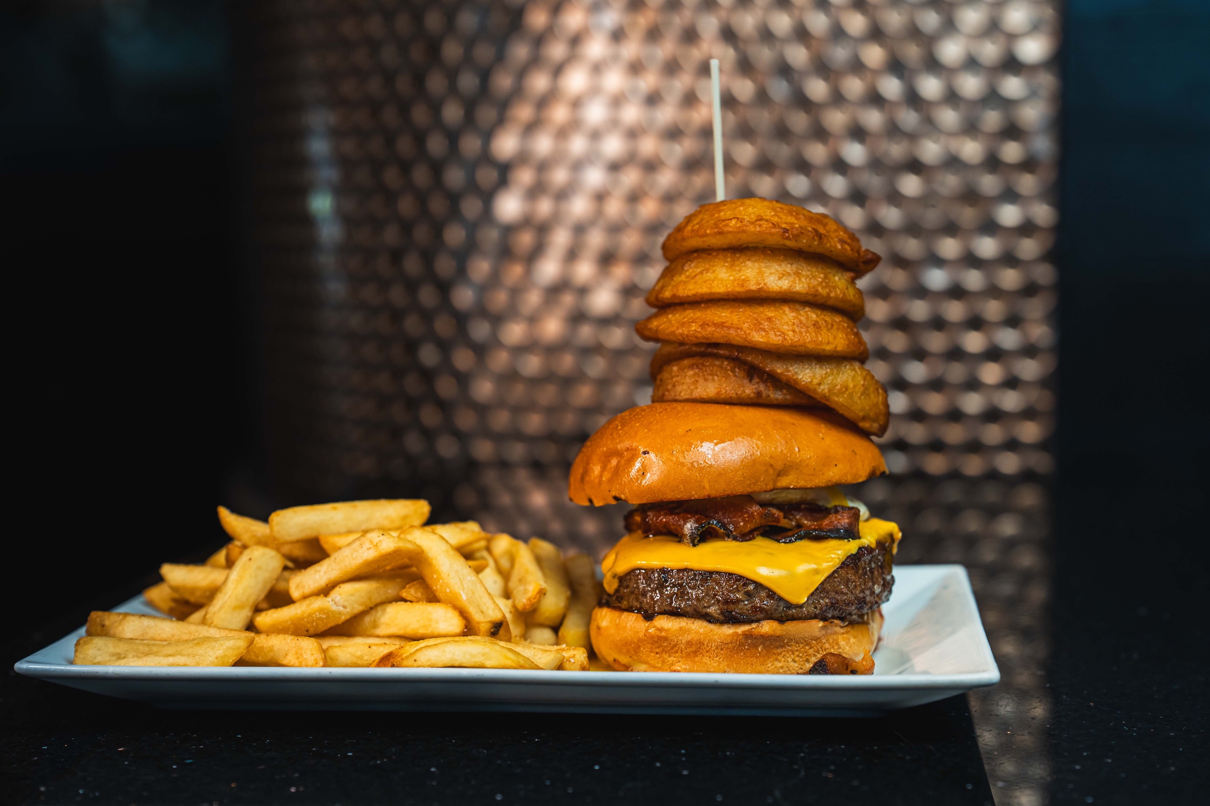 a plate of burger and fries