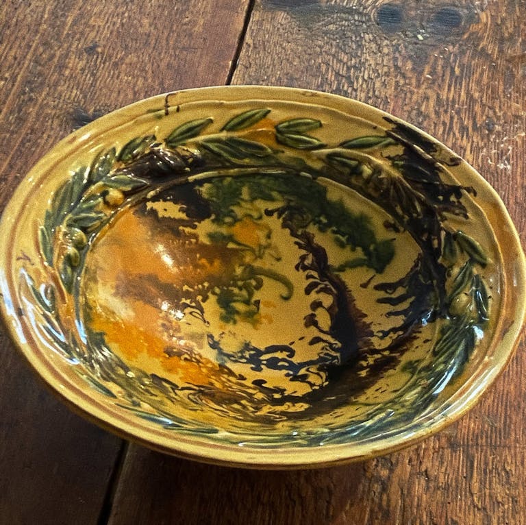 a brown bowl on a table