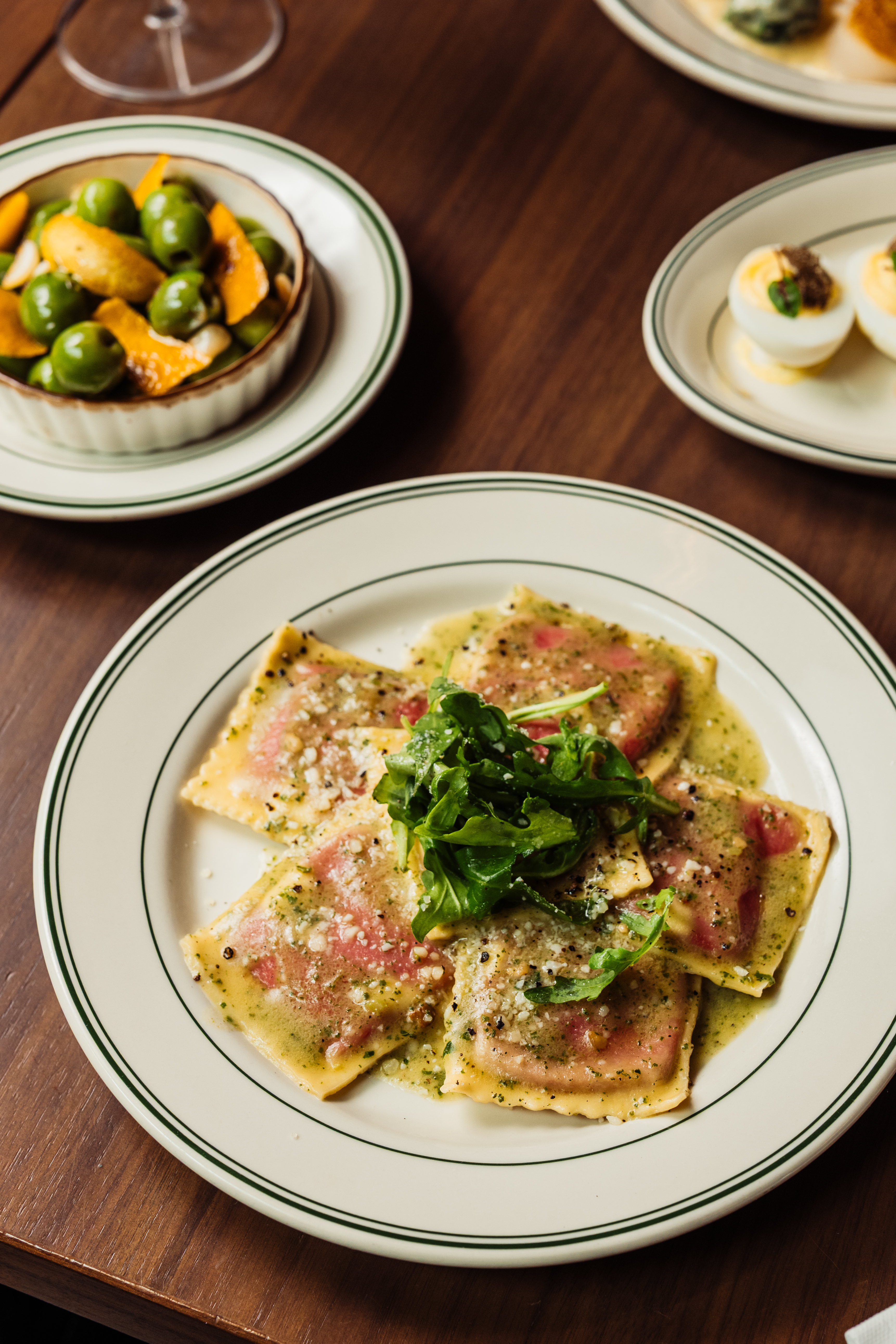 Ravioli and Olives sitting on the table