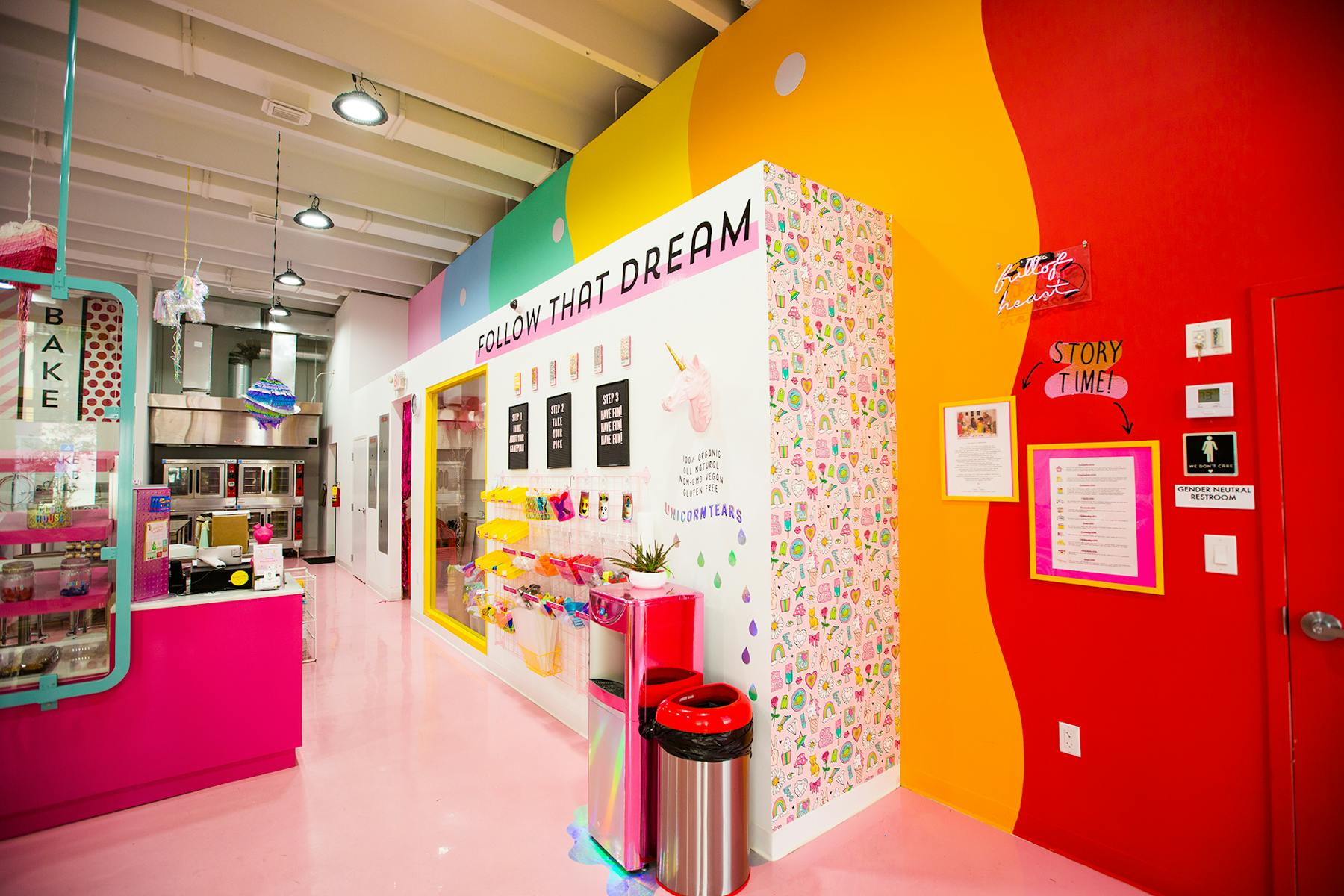 a red refrigerator in a store