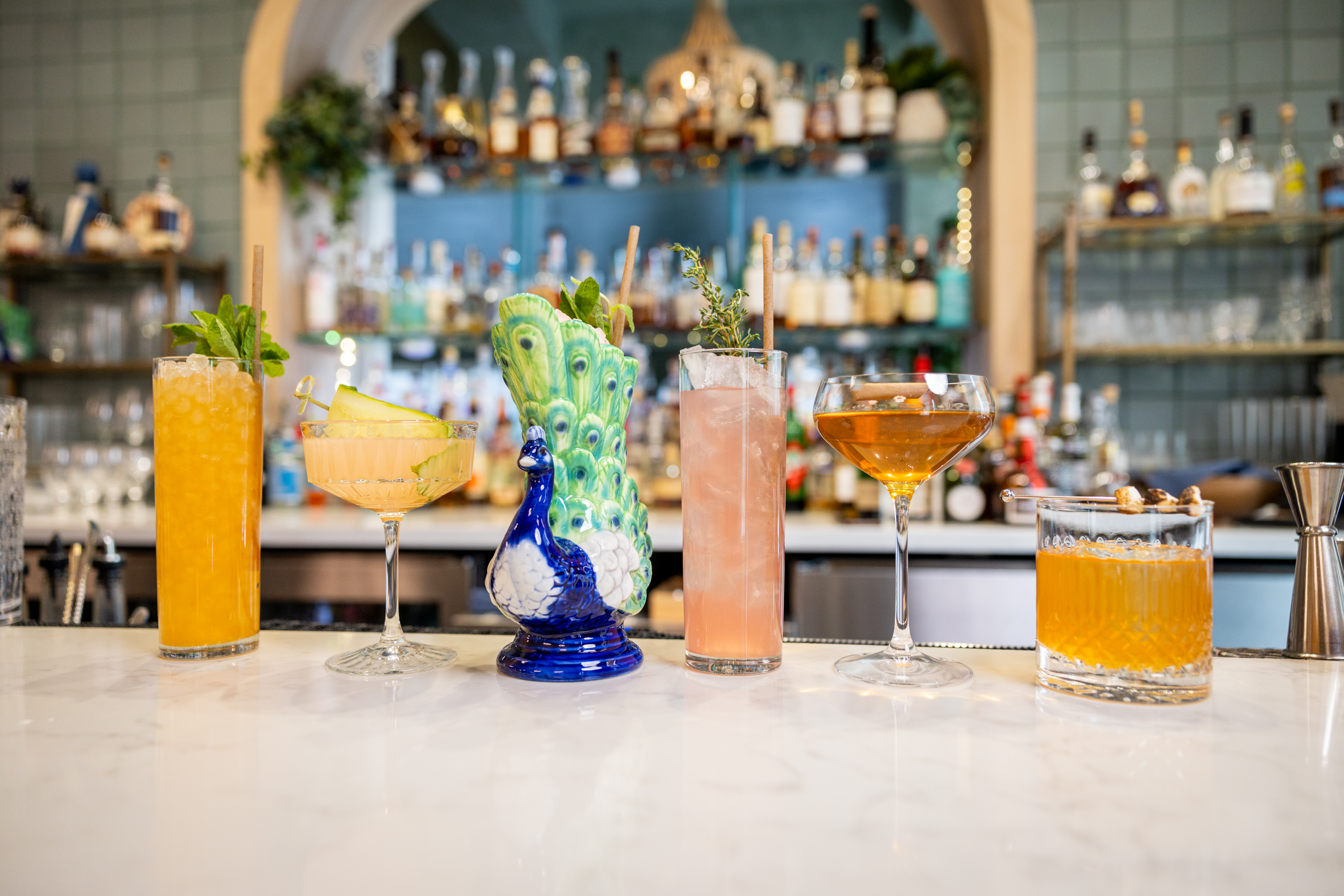 a group of glass bottles on a table