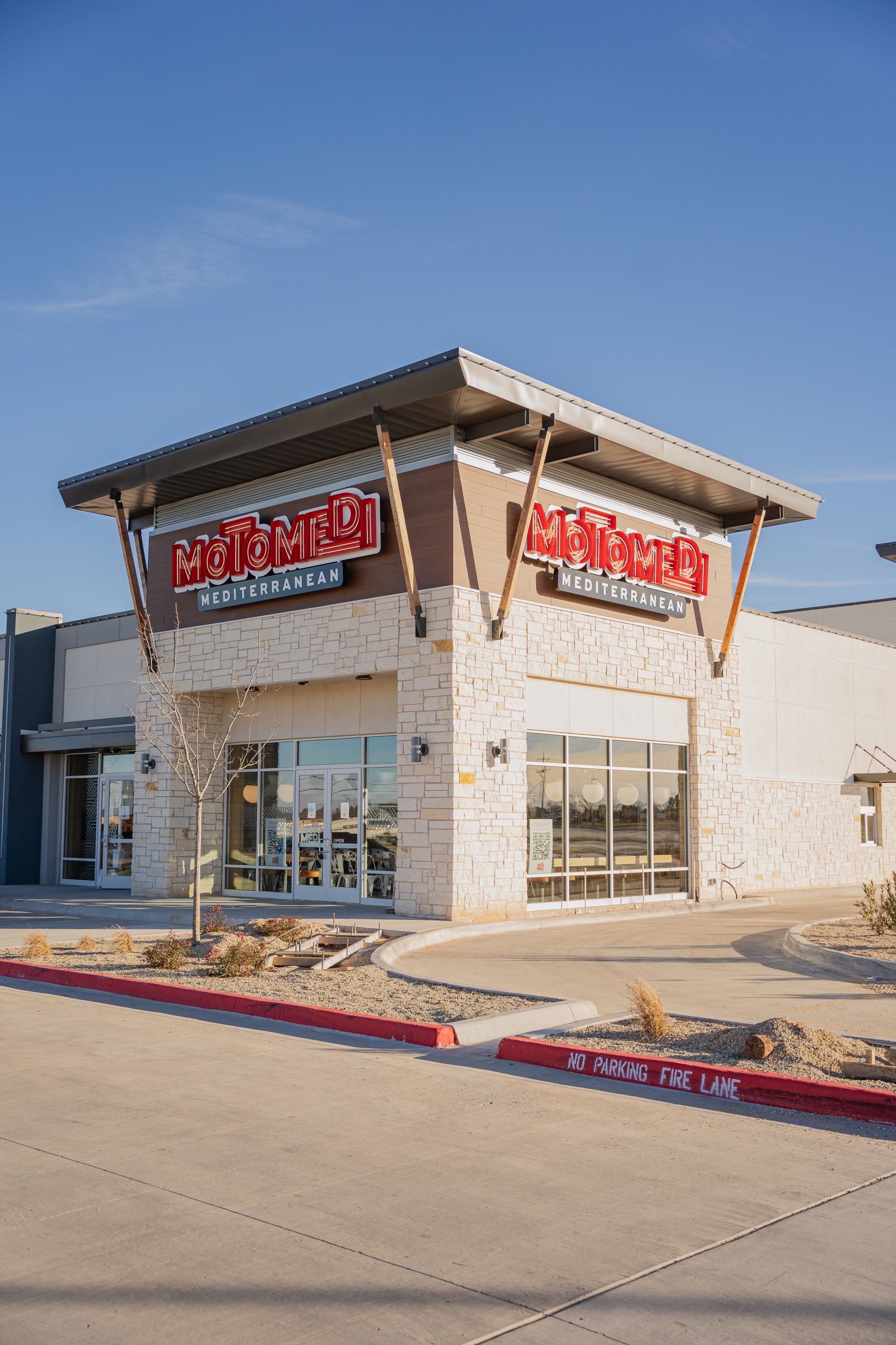 a sign in front of a building