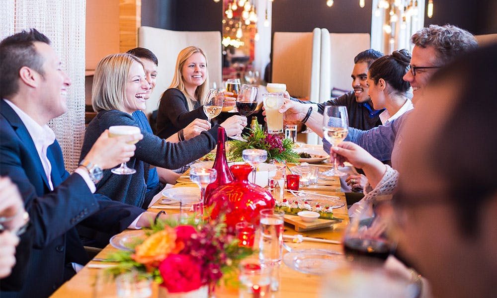 a group of people sitting at a table