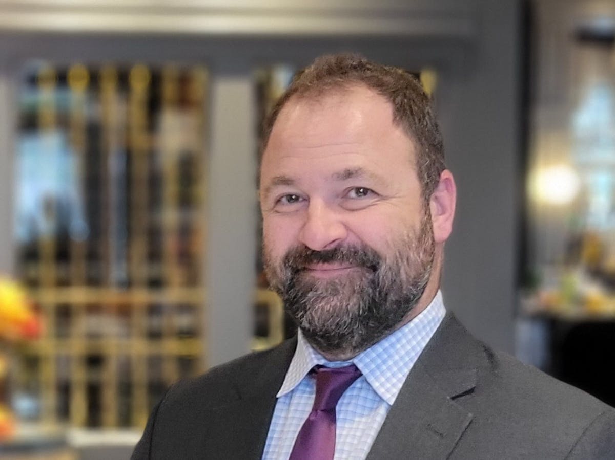 a man wearing a suit and tie