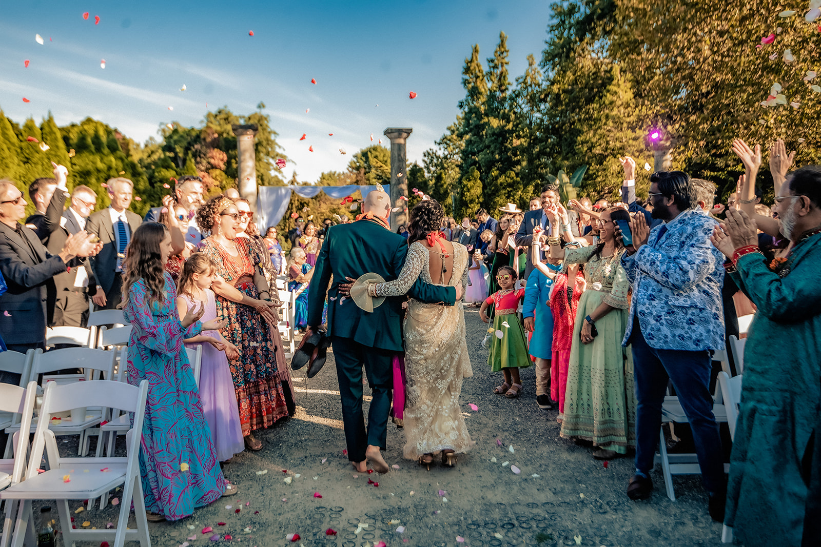 a man and woman hugging in front of a crowd of people