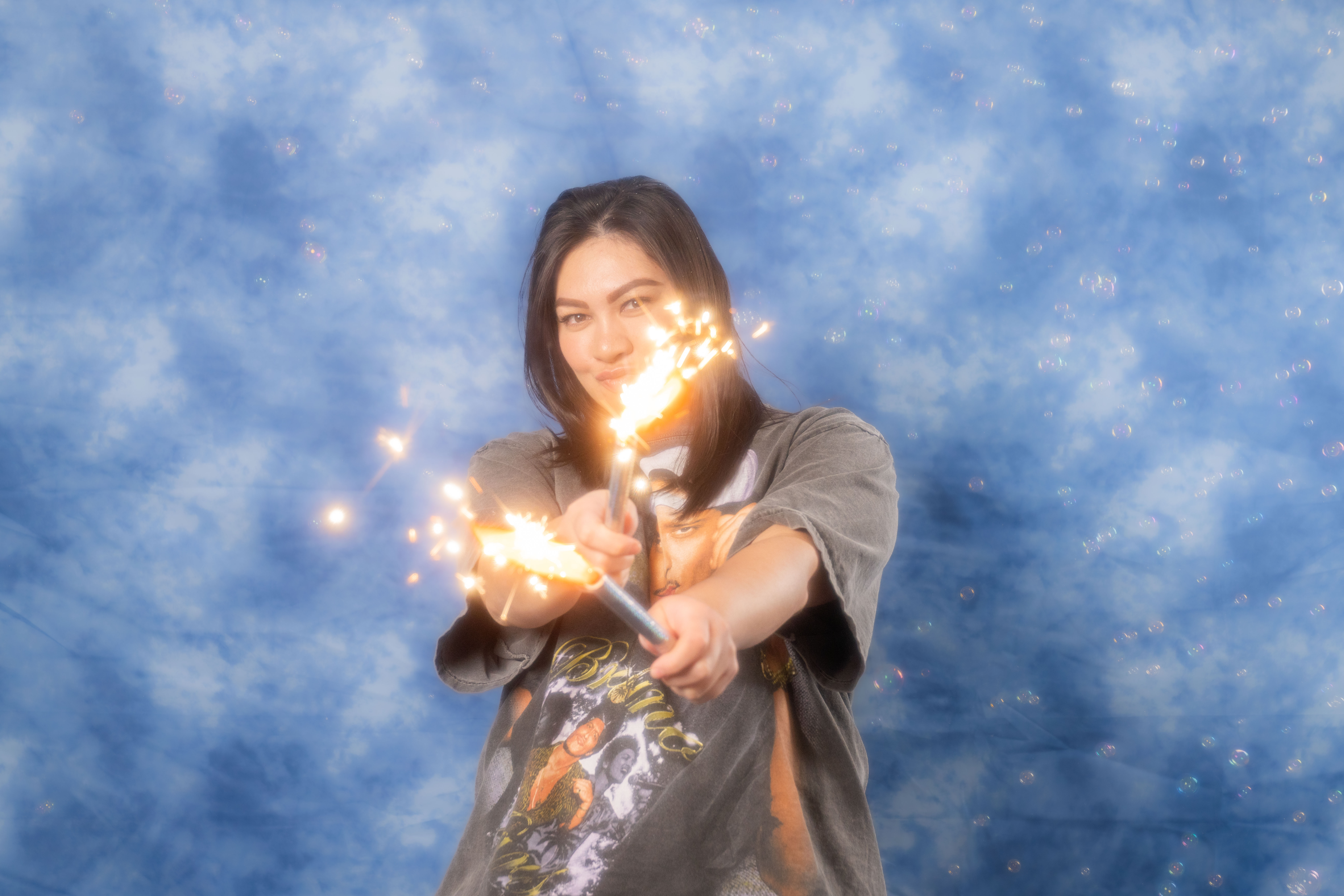 a woman standing next to a body of water