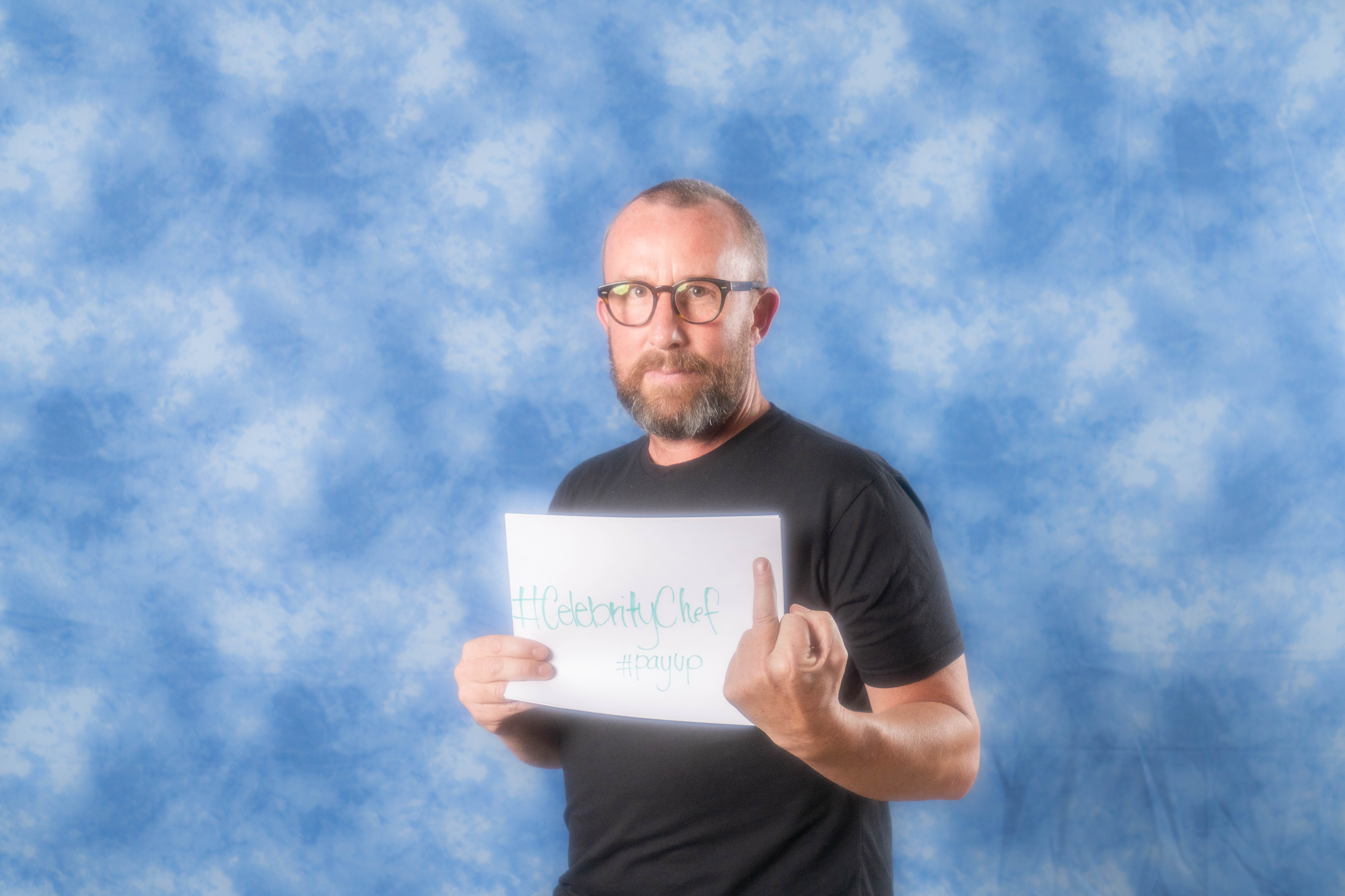 a man holding a frisbee