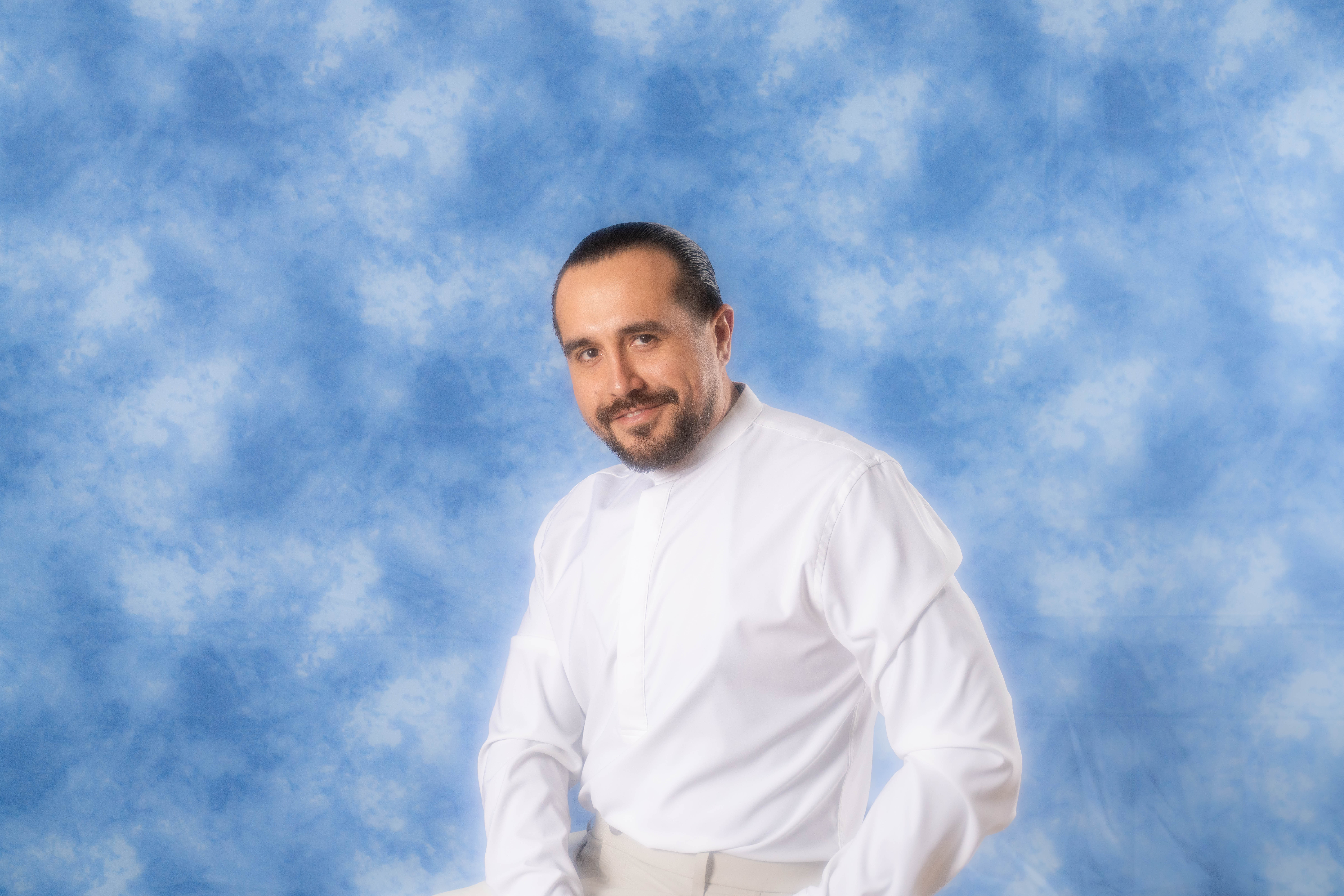 a man in a blue shirt