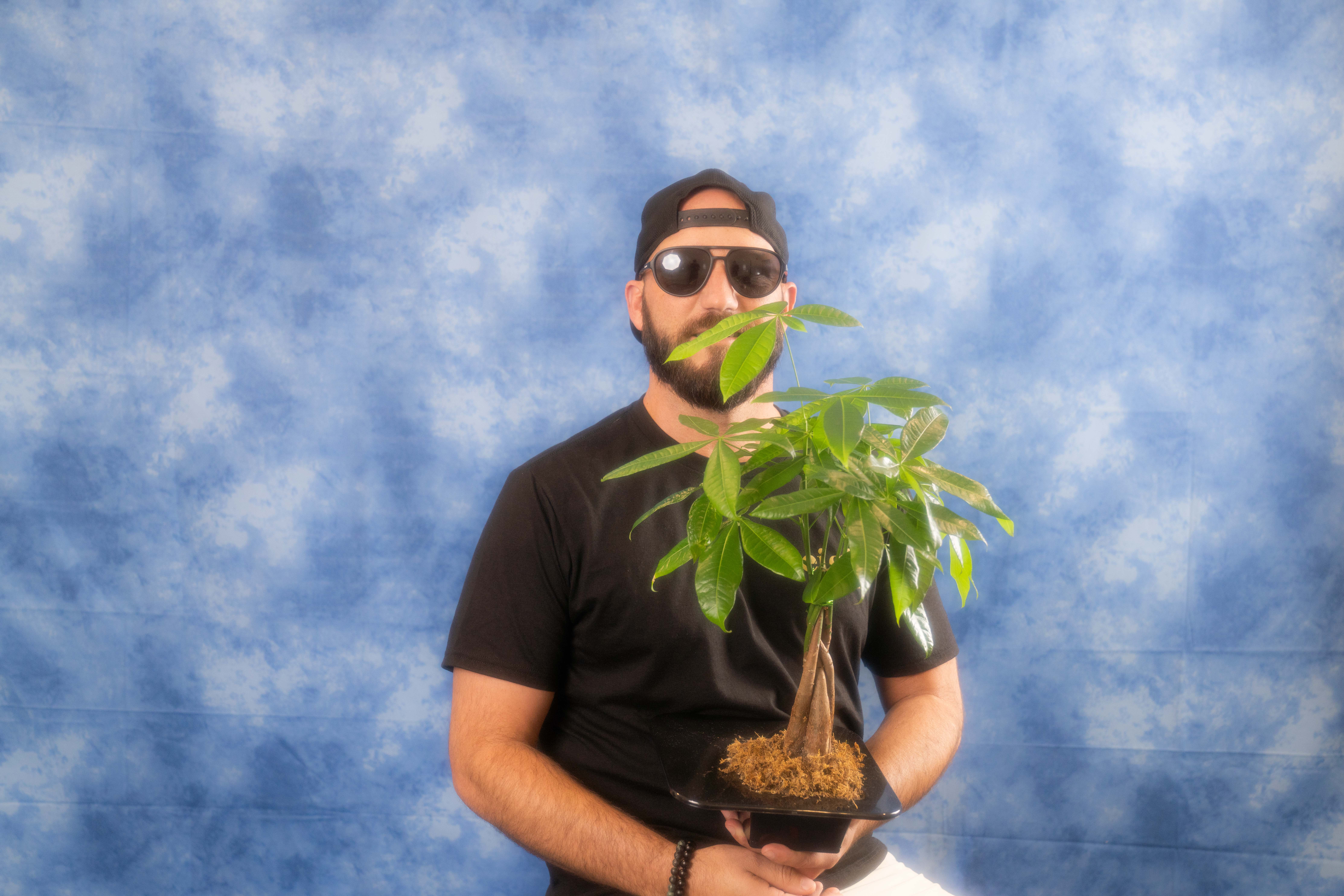 a man wearing a green shirt
