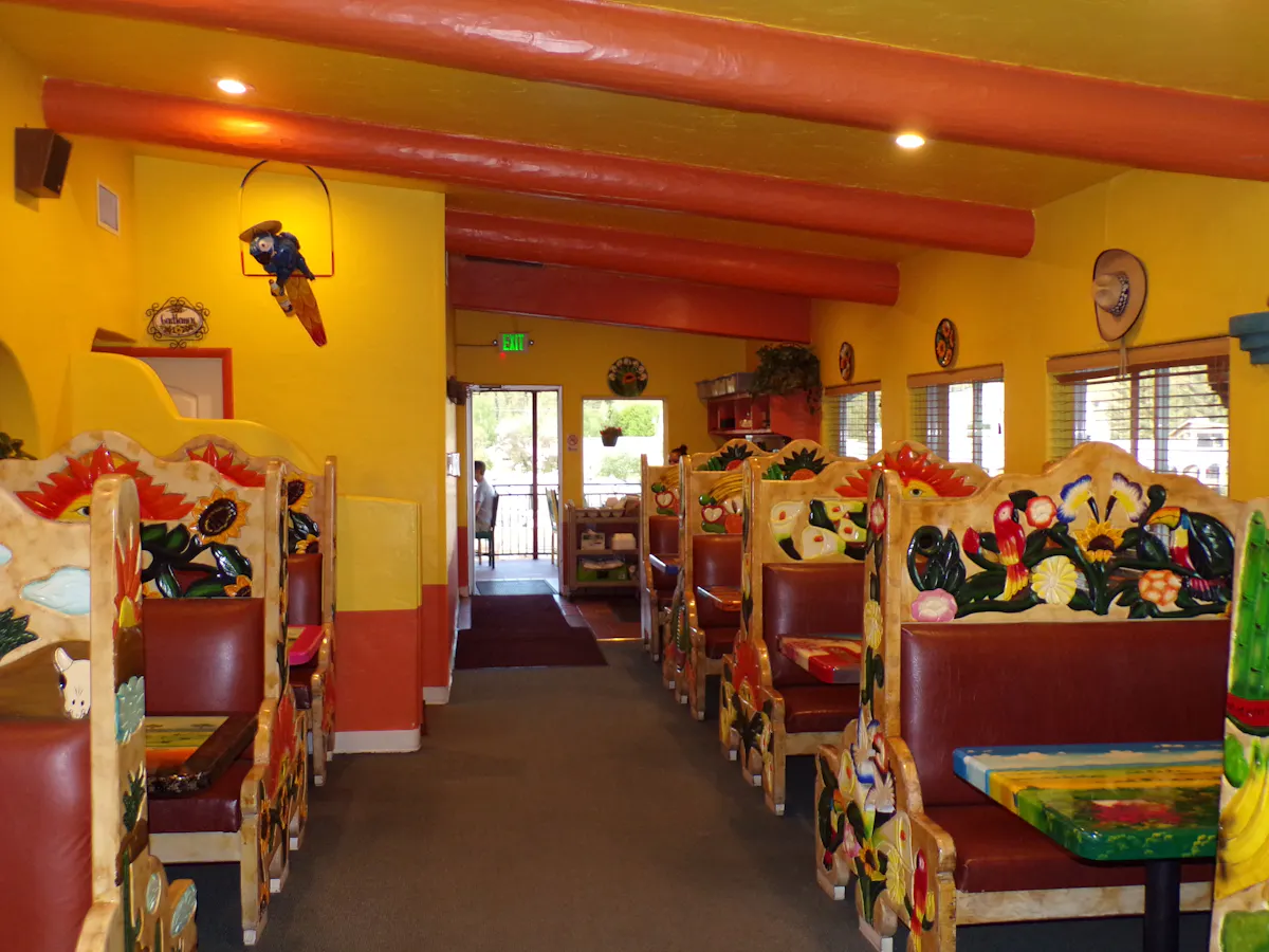a room filled with furniture and a table