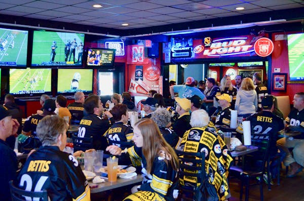 a group of people in a restaurant