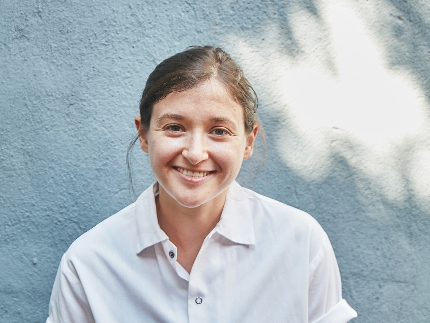 a woman smiling for the camera