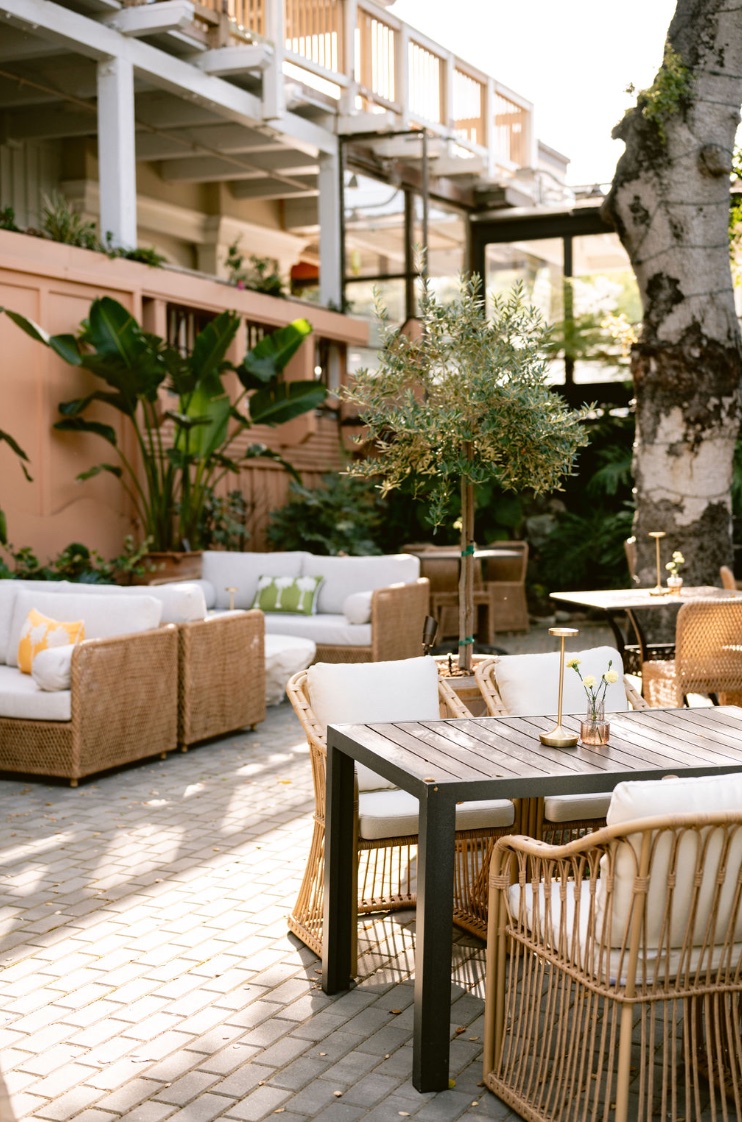 a dining room table in front of a building
