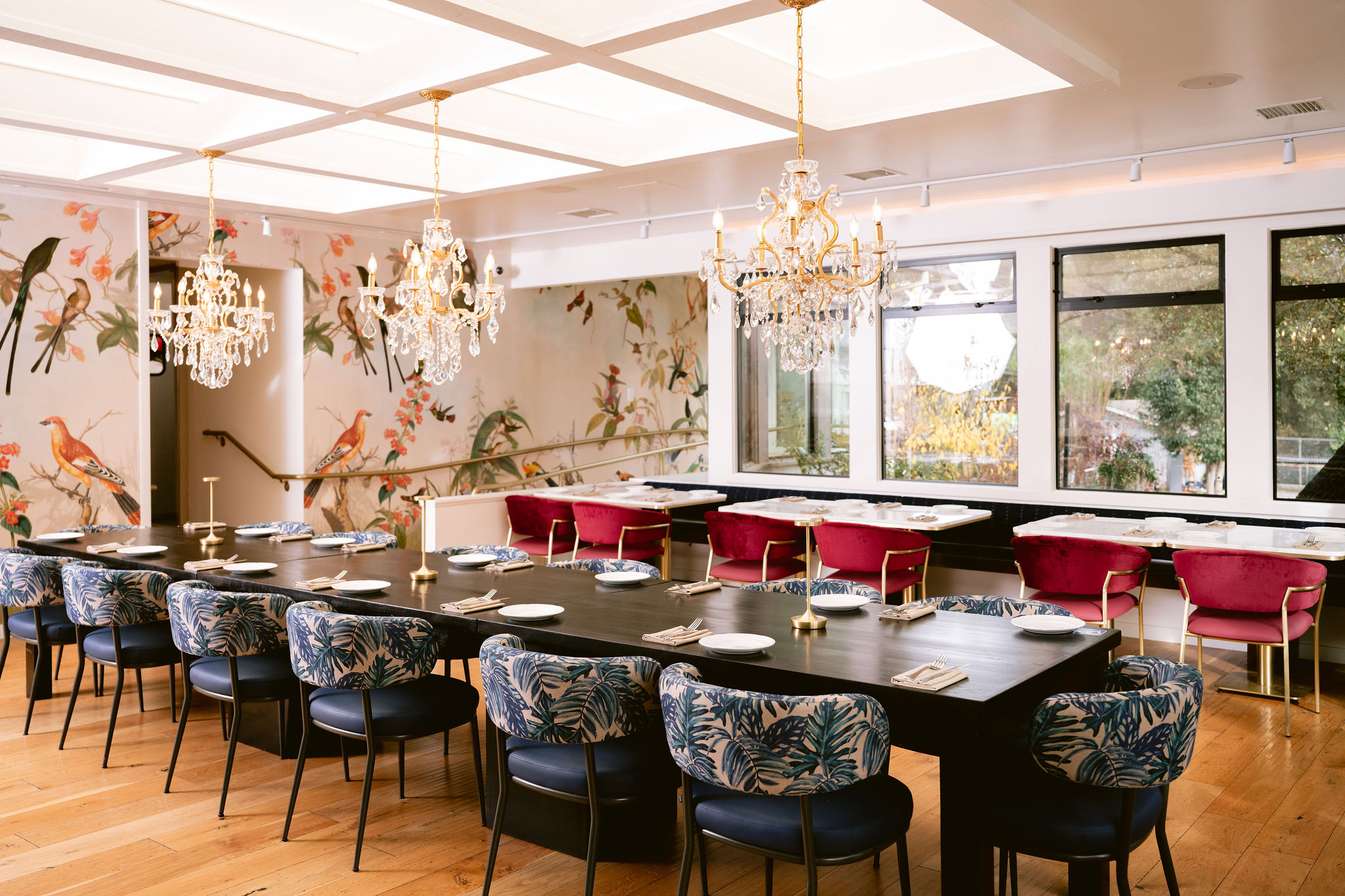 a room with a large table and chairs