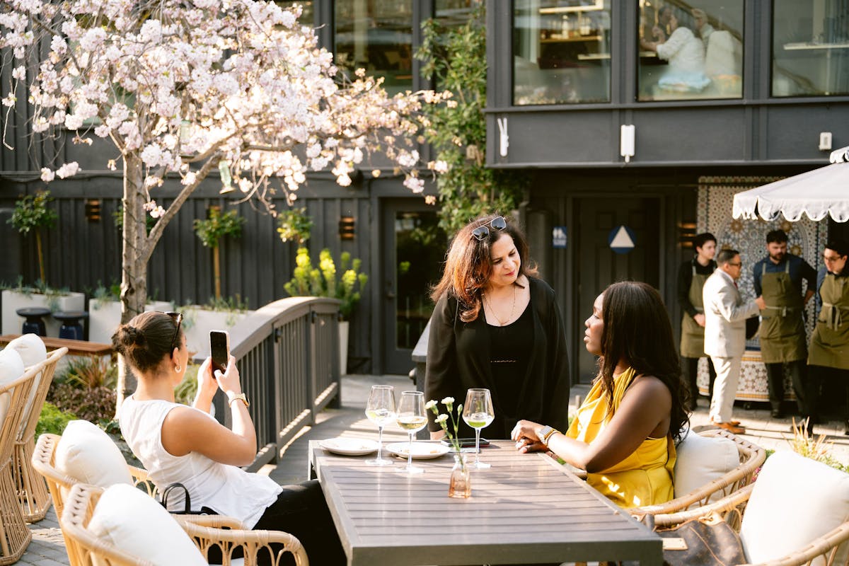 a group of people sitting at a table