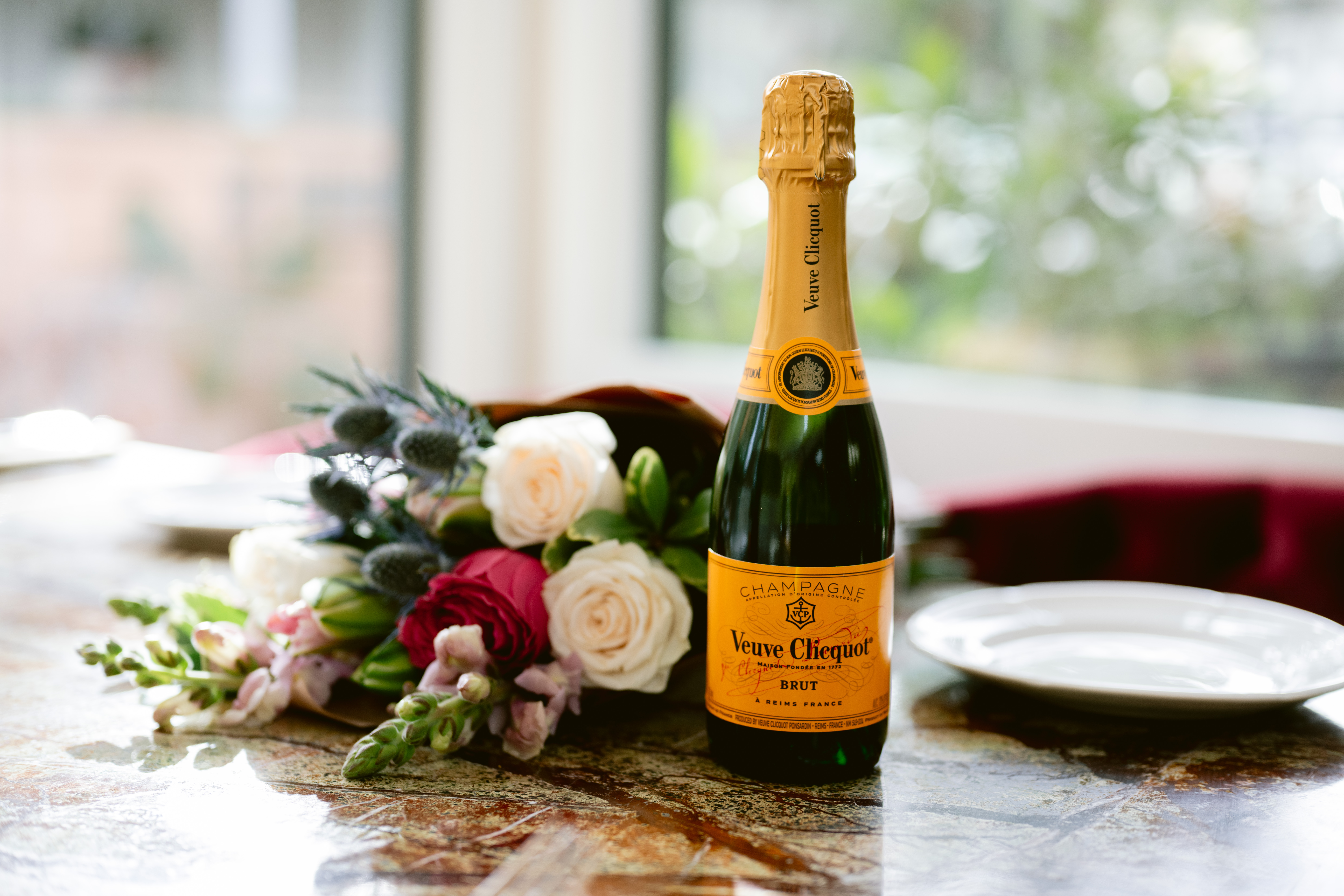 a close up of a bottle of wine on a table