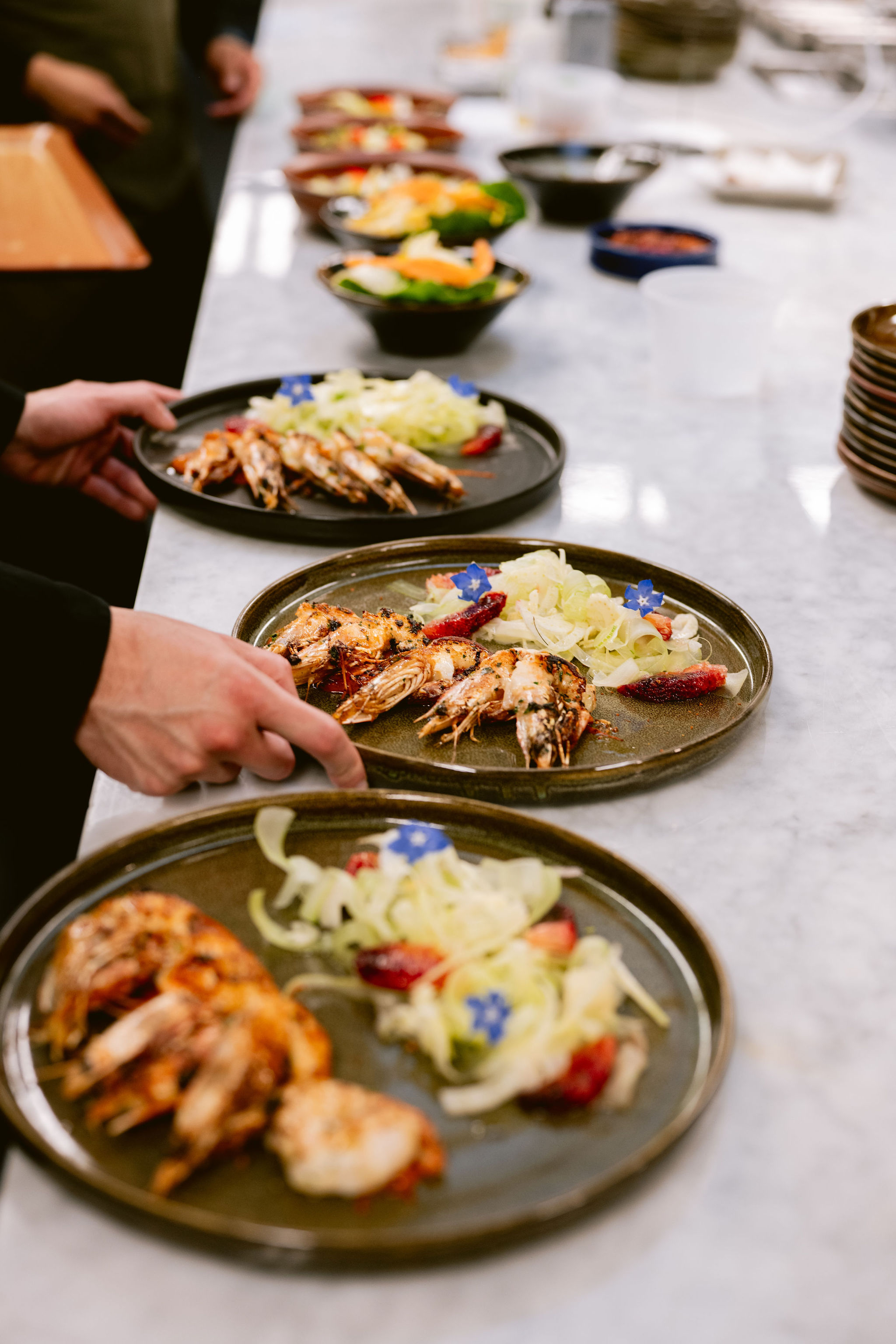 a person holding a plate of food