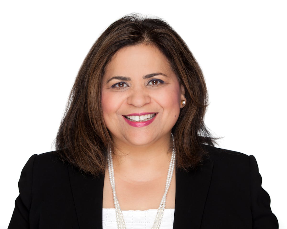 a woman smiling for the camera