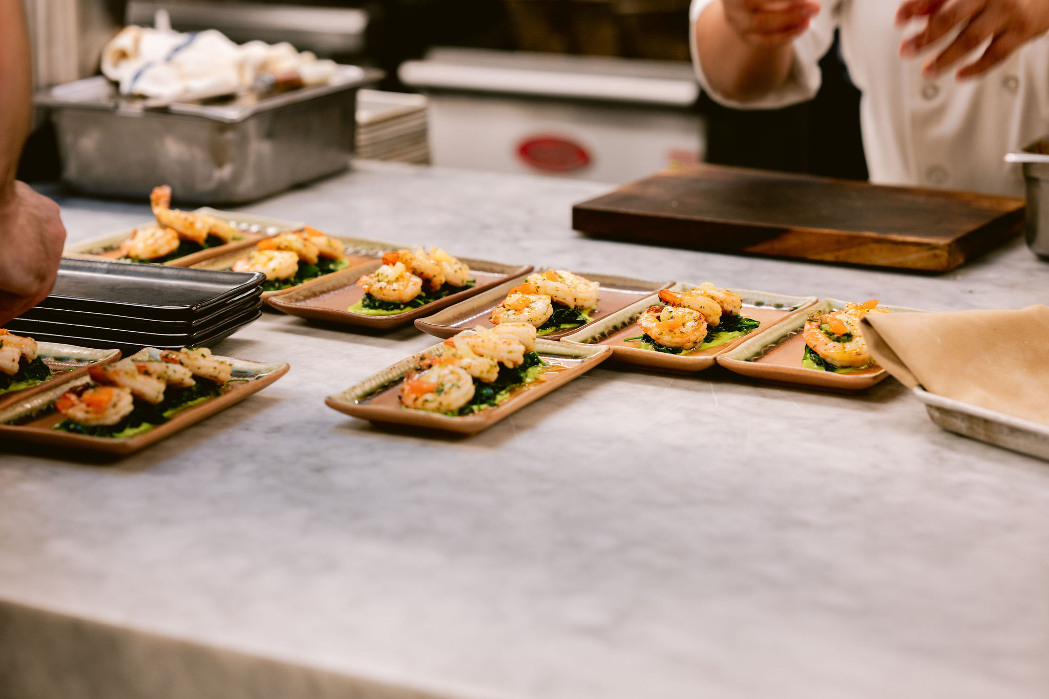 a group of plates of food on a table