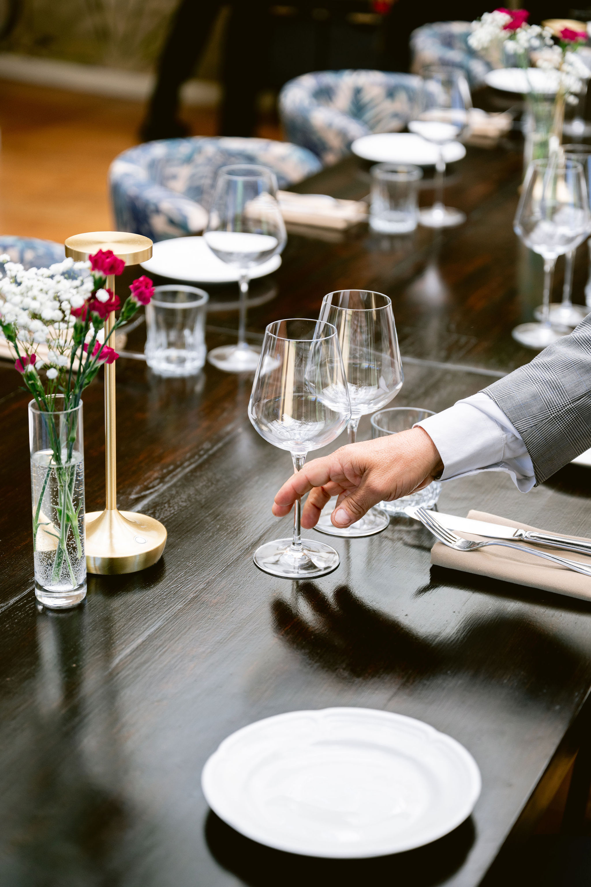 a person holding a wine glass