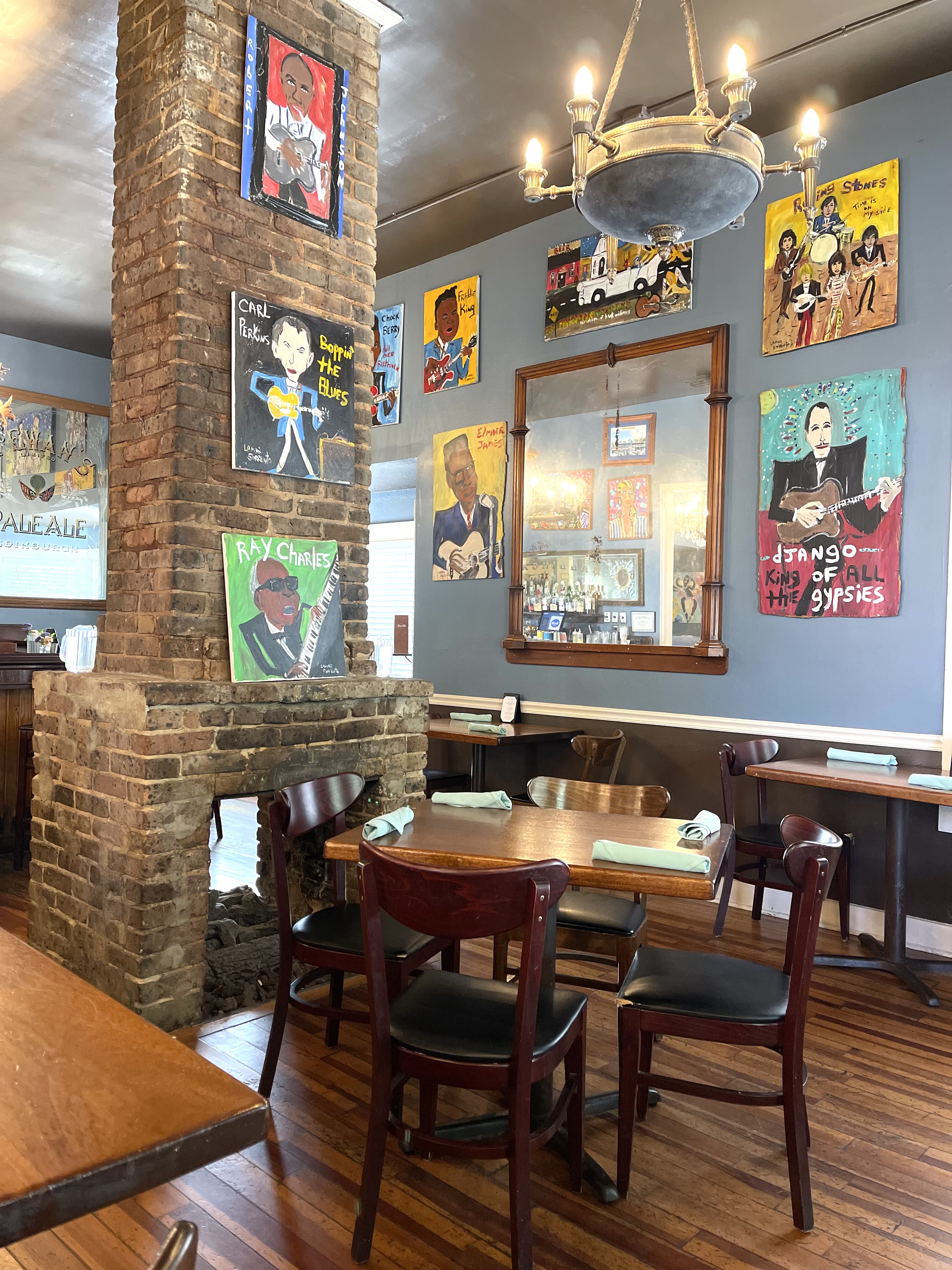 a room with a desk and chair in a restaurant