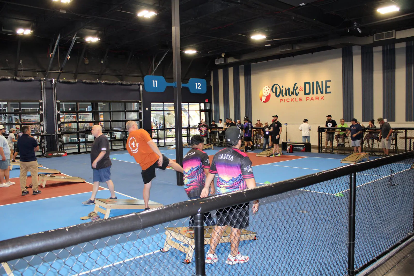 Cornhole league and tournament night at Dink & Dine Pickle Park in the Phoenix Valley