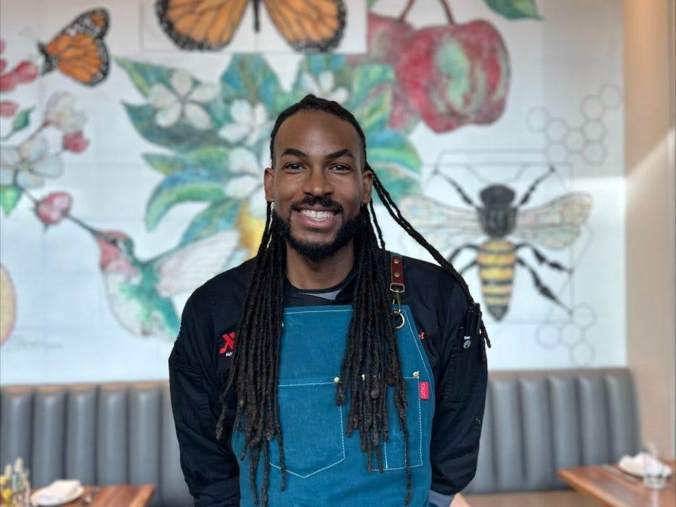 a man standing in the restaurant
