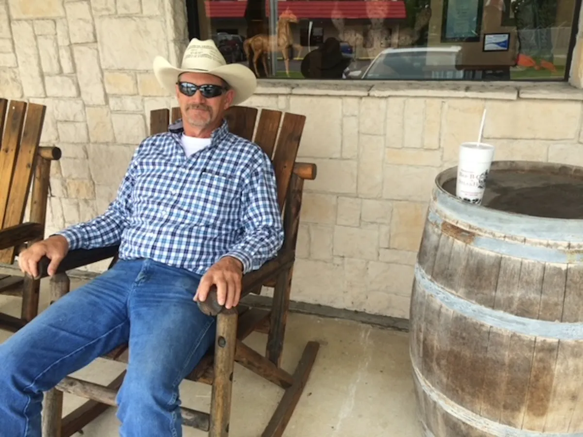 a man sitting on a bench