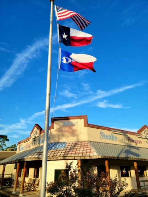 a flag on the side of a building