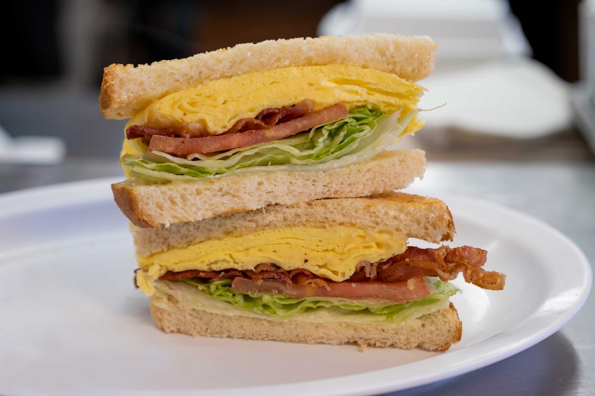 a sandwich cut in half on a plate