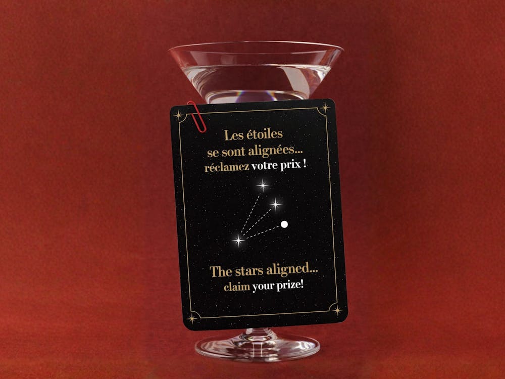 a glass bottle sitting on a table