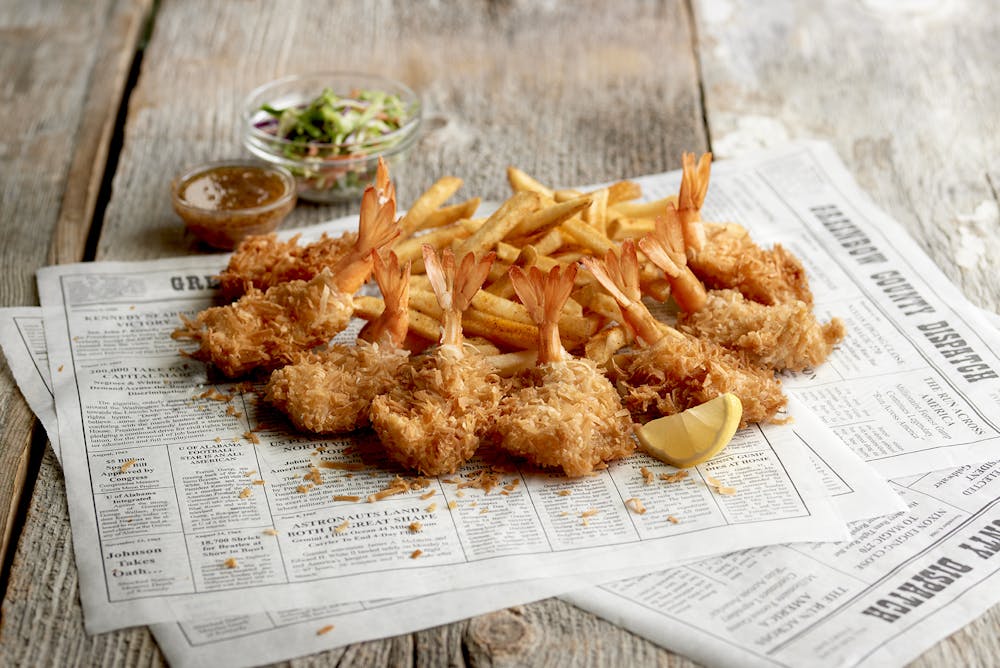 a sandwich sitting on top of a wooden table
